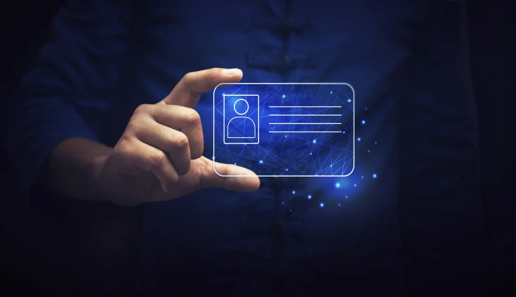 Eine menschliche Hand, die einen digitalen Ausweis hält